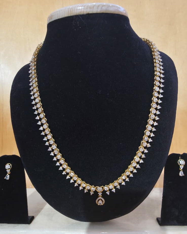 Gold-toned AD necklace and earrings set