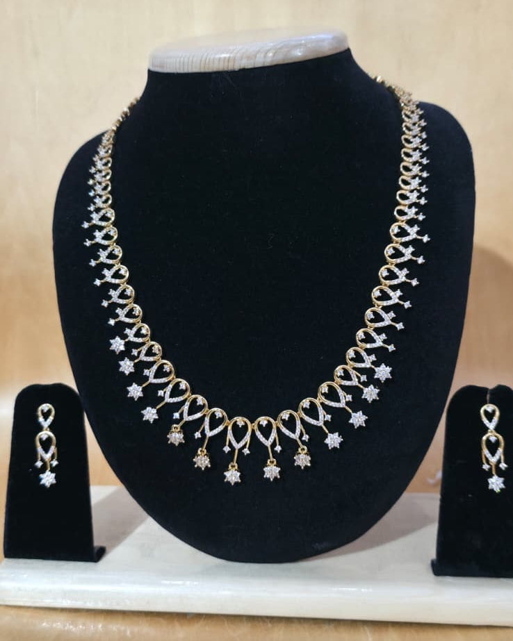 Premium finish party wear necklace with diamond look stones