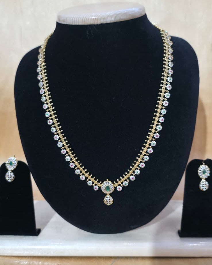 Gold-plated stone-studded short necklace and earring set